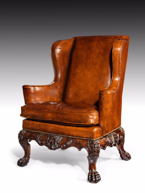 A Handsome Late Victorian Leather Carved Wing Chair