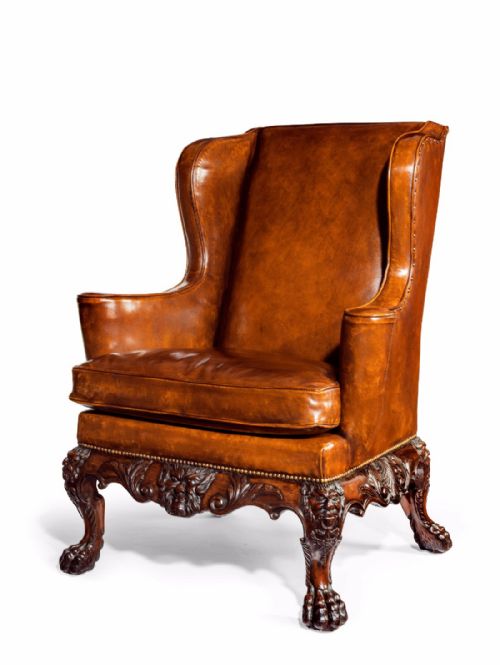 fig 1. A Handsome Late Victorian Leather Carved Wing Chair