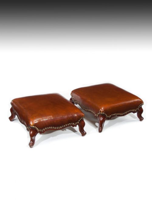 A Good Pair of Leather Upholstered Victorian Mahogany Footstools