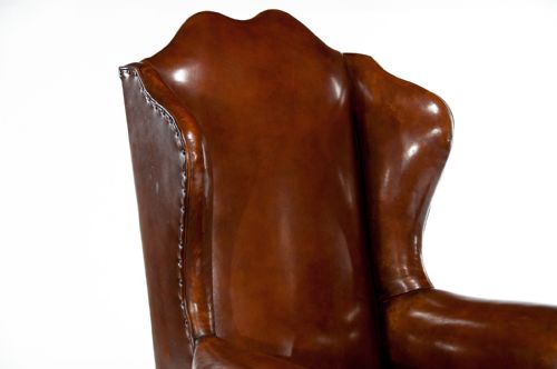 fig 3. A Quality Walnut Leather Upholstered Wing Chair