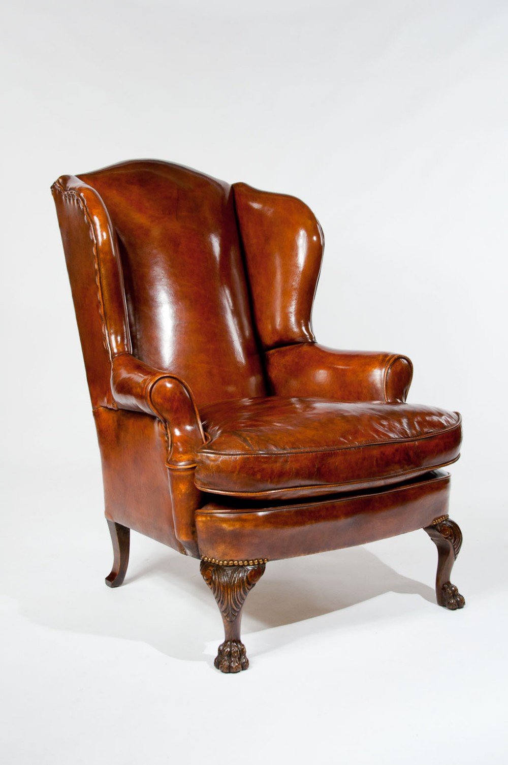 Antique Leather Upholstered Wing Chair 
