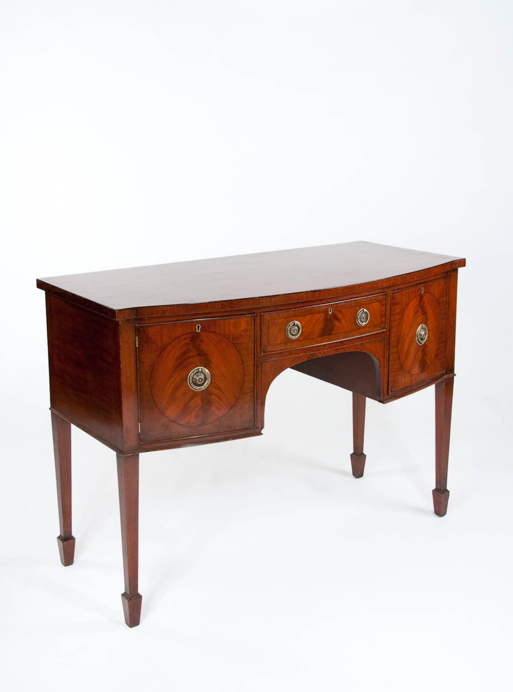 A late 19th Century Mahogany Bow Sideboard 