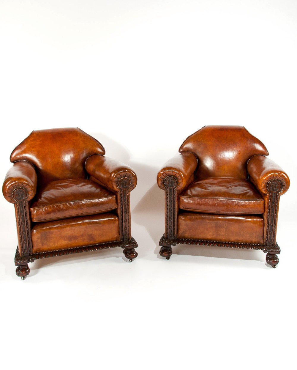 A Exceptional Pair of Victorian Leather Armchairs