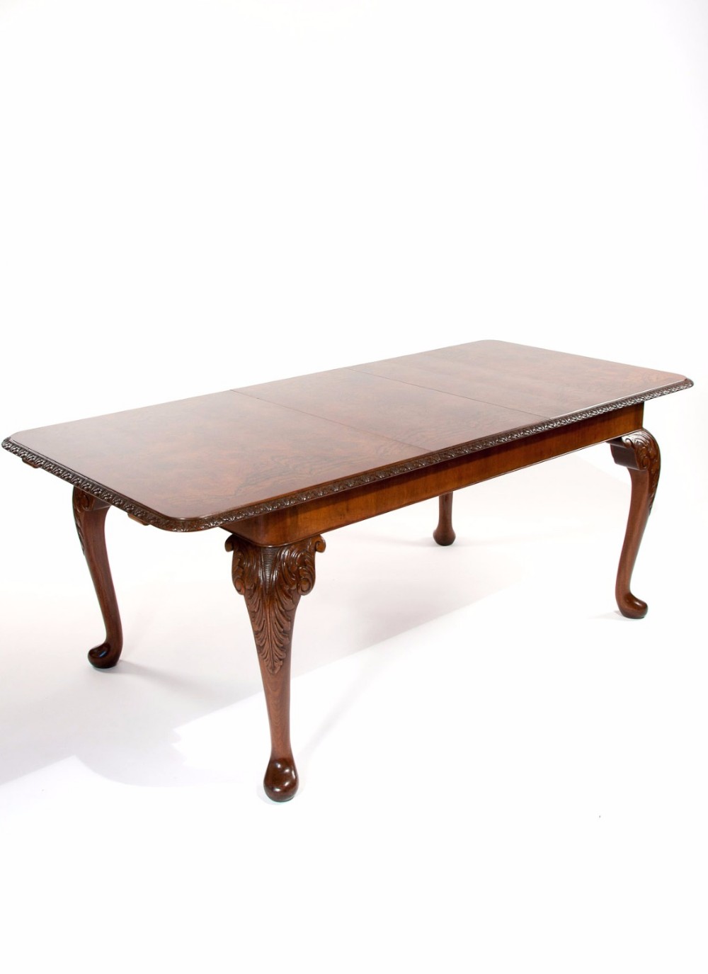 A Quality Burr Walnut Extending Dining Table