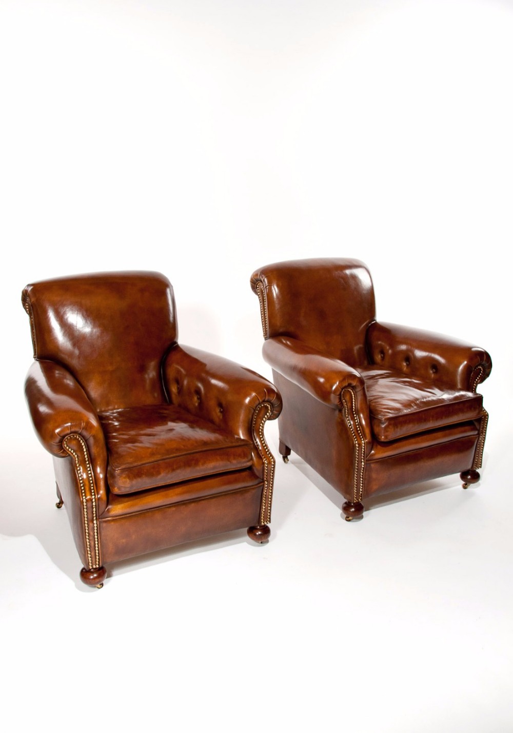 Fine Pair Of Antique Leather Club Armchairs