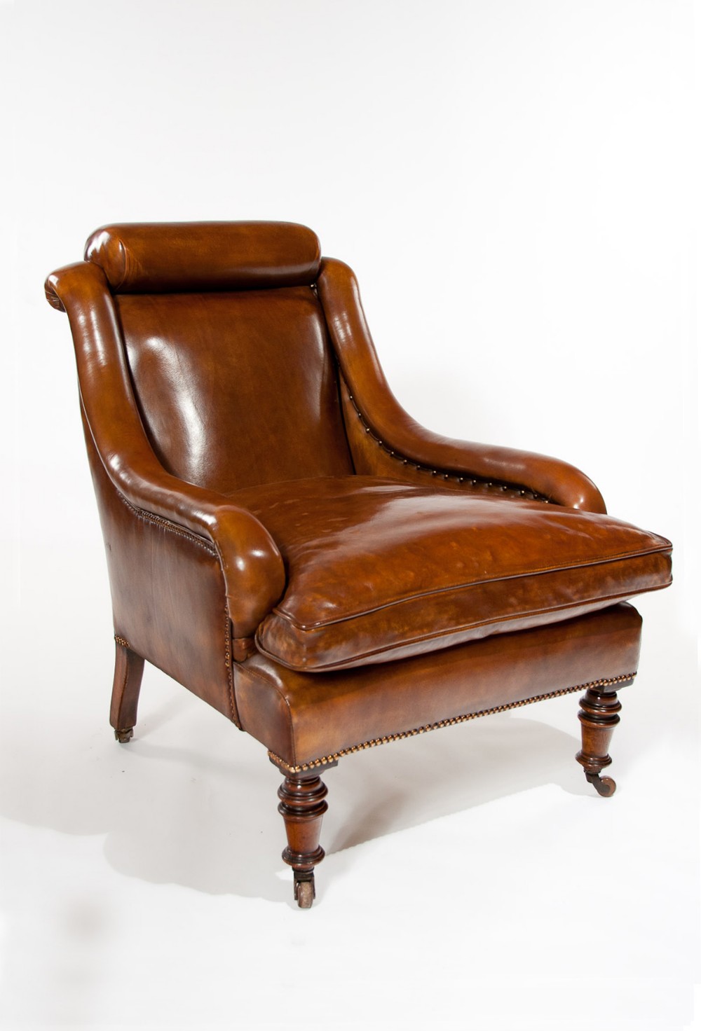 An Attractive Antique 19th Century Walnut Leather Armchair