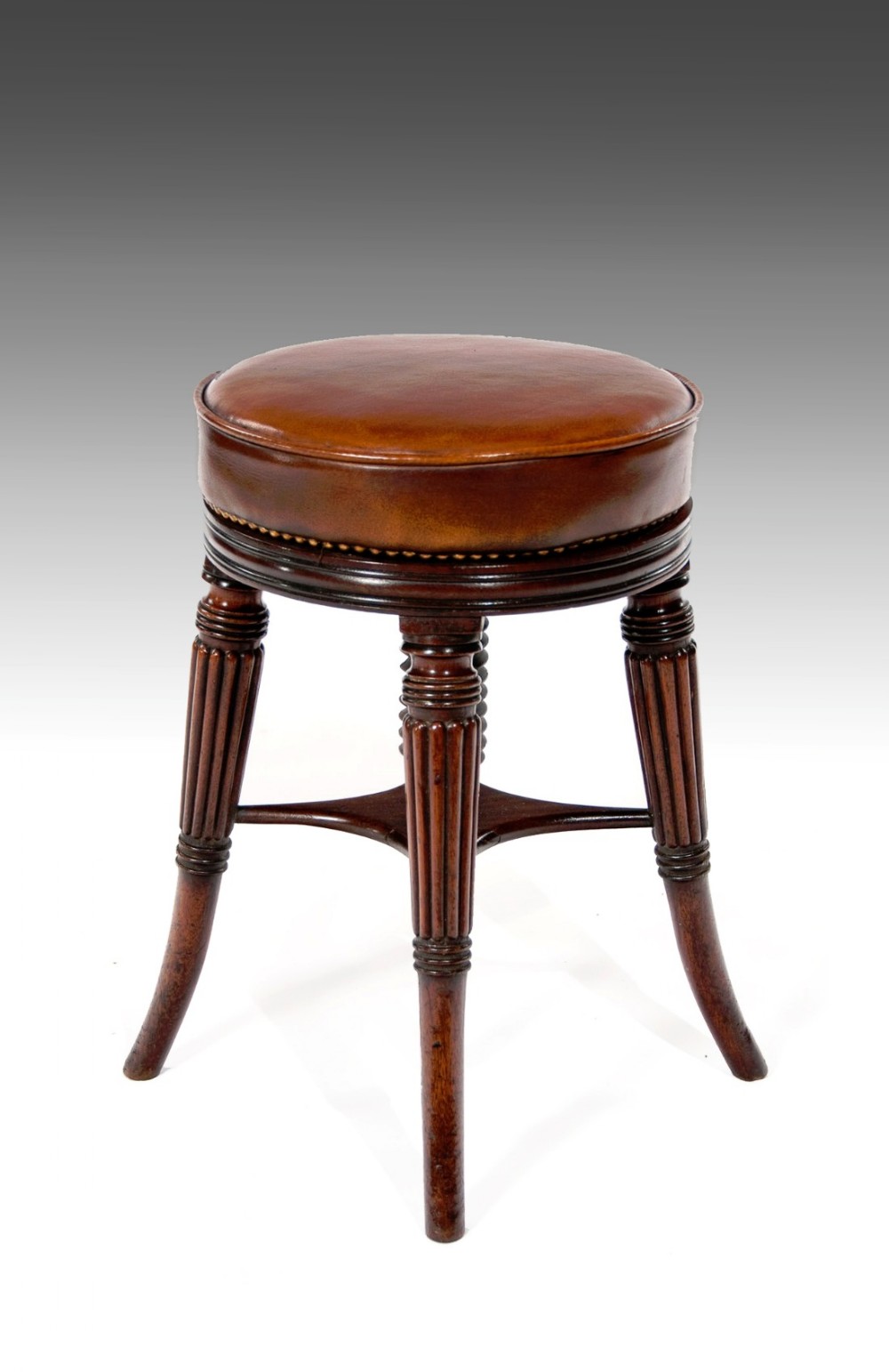 A Fine Regency Mahogany Adjustable Piano Stool
