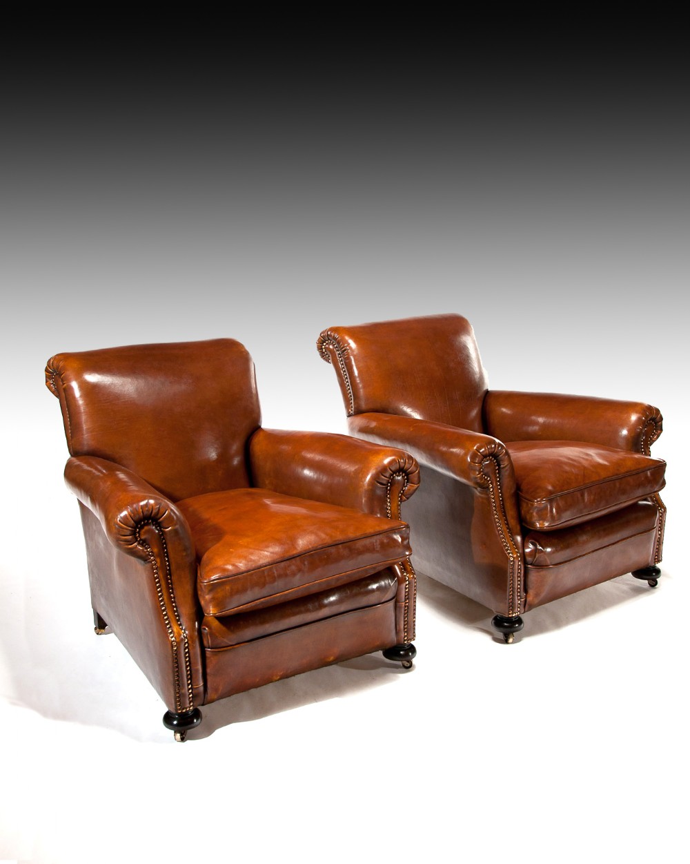 Fine Pair Of Antique Leather Club Armchairs