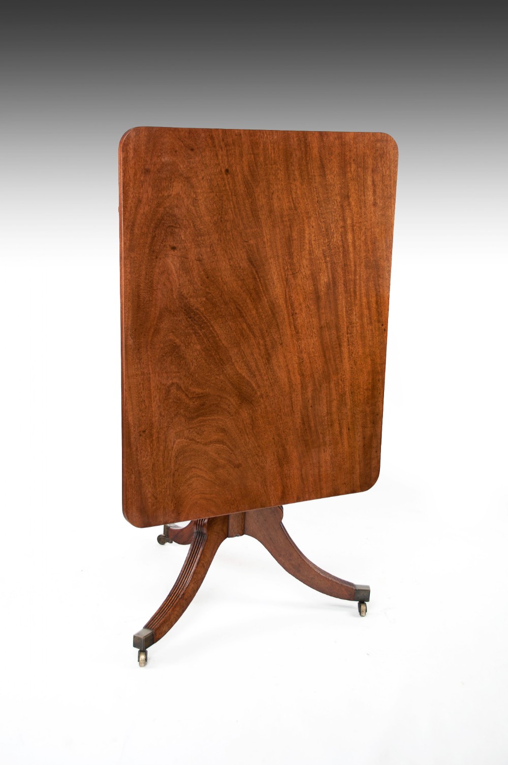 A Georgian Mahogany Tilt Top Table