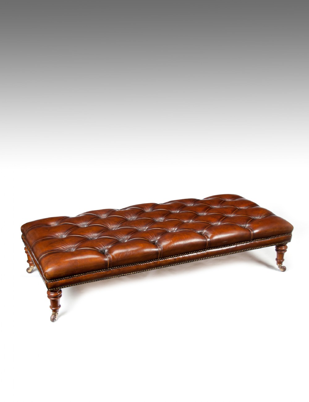 Large 19th Century Deep Buttoned leather Walnut Stool
