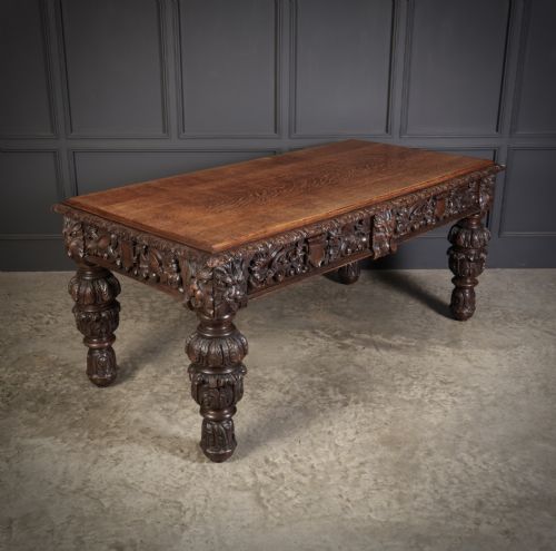 LARGE IMPRESSIVE CARVED OAK WRITING TABLE - ADDITIONAL PHOTO 1