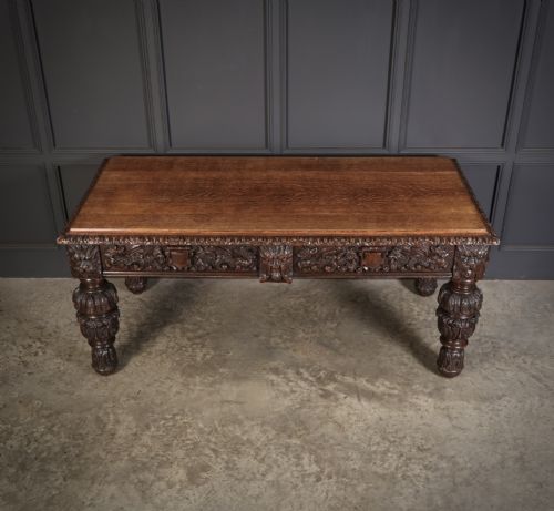 LARGE IMPRESSIVE CARVED OAK WRITING TABLE - ADDITIONAL PHOTO 2