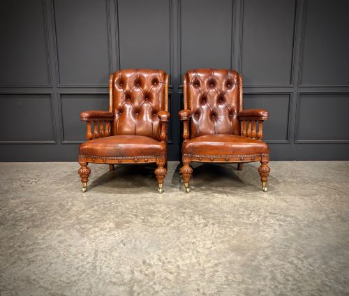 PAIR OF OAK BUTTONED LEATHER LIBRARY ARMCHAIRS - ADDITIONAL PHOTO 1