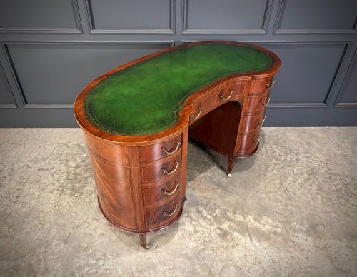 EDWARDIAN MAHOGANY KIDNEY SHAPED DESK