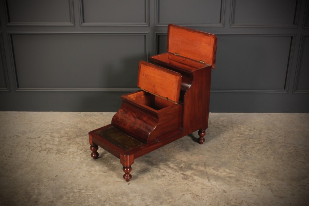 A three-tier Victorian mahogany library step unit featuring leather-lined treads and turned wooden feet. View VIII