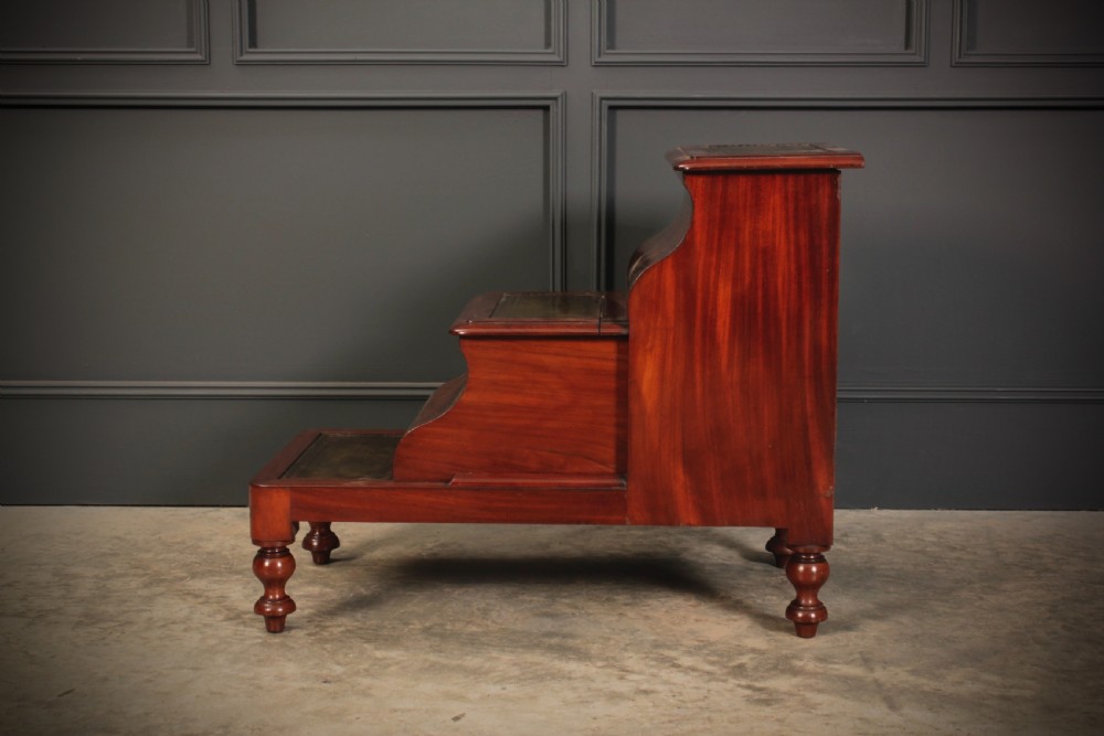A three-tier Victorian mahogany library step unit featuring leather-lined treads and turned wooden feet. View IX