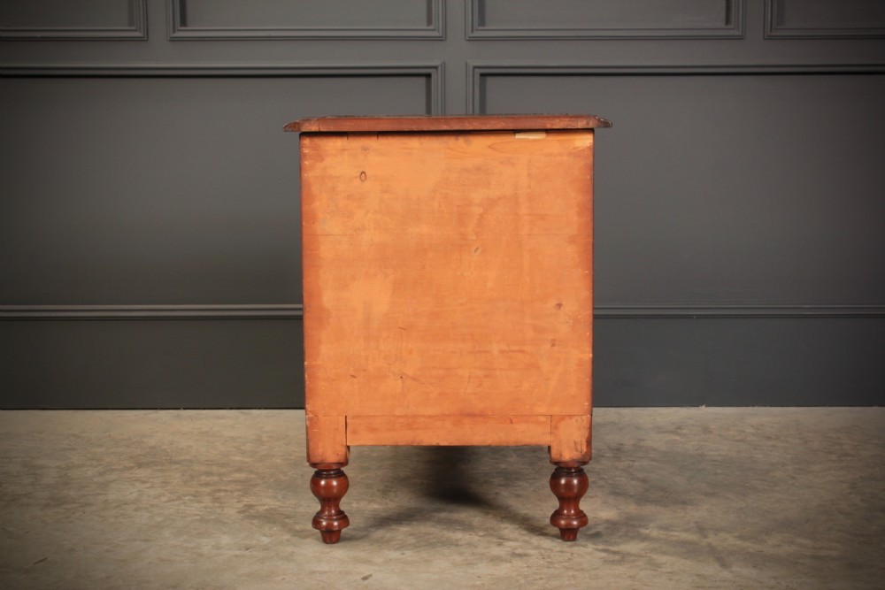 A three-tier Victorian mahogany library step unit featuring leather-lined treads and turned wooden feet. View X