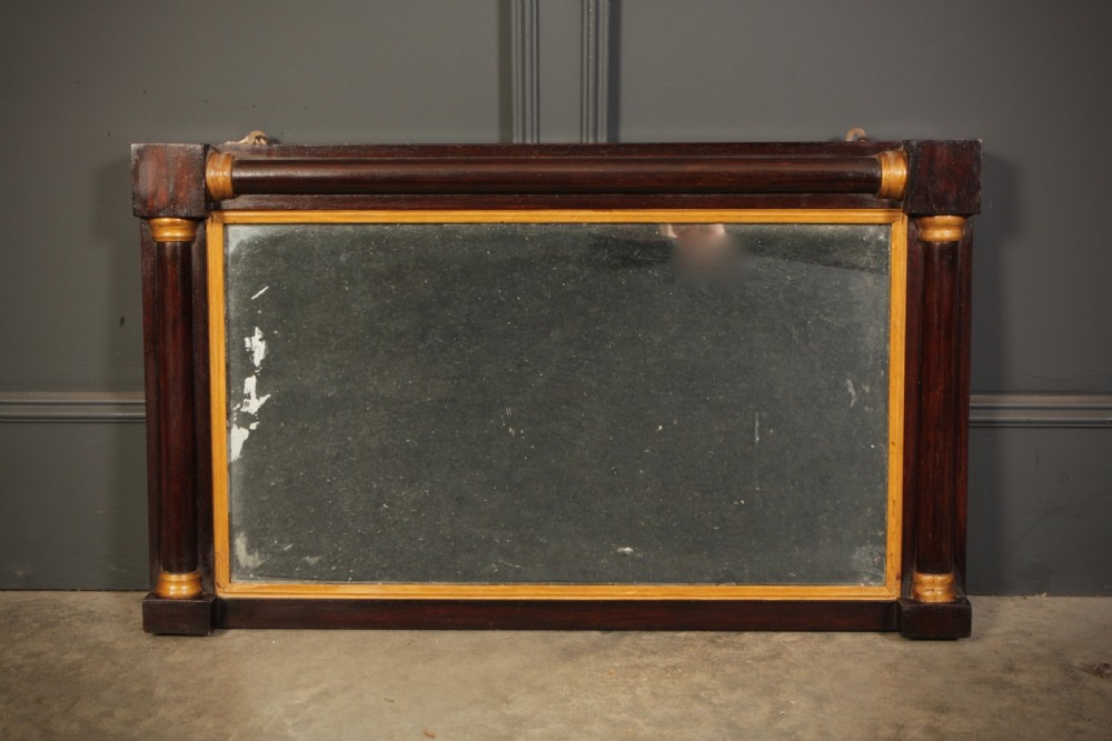 A broad rectangular antique rosewood overmantel mirror featuring pilaster side columns and a gilded inner slip moulding. View II