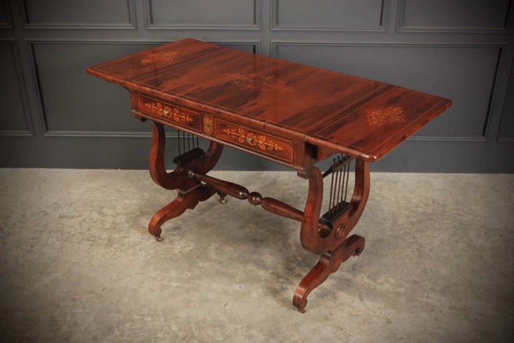 An antique dark brown rosewood sofa table featuring floral marquetry inlay, two drop leaves, twin drawers, and lyre trestle supports. View VII