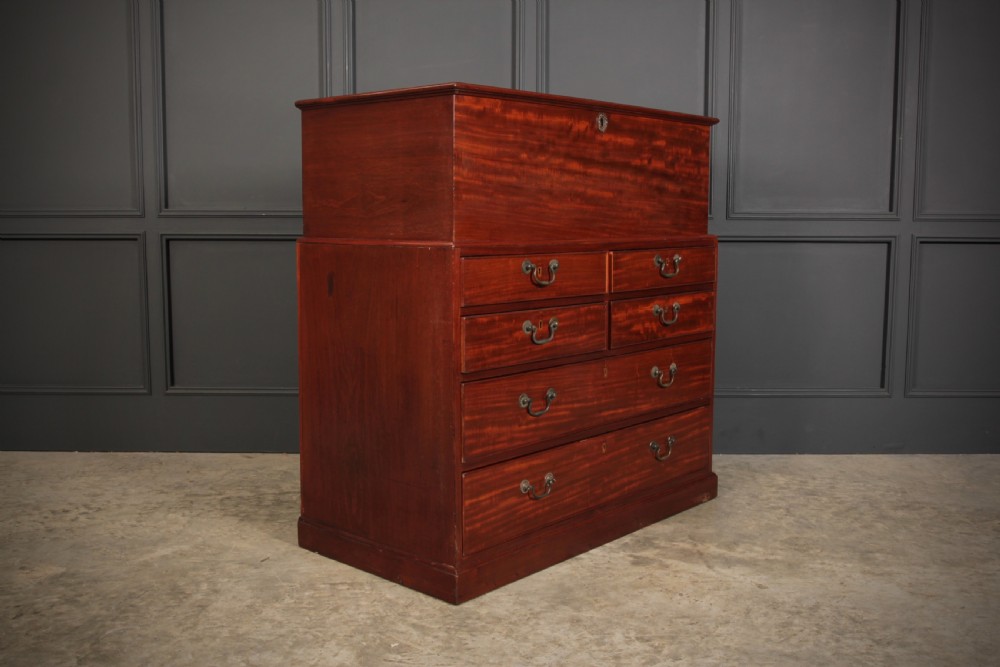 A Georgian mahogany mule chest featuring a top hinged lid above four drawers with brass handles. View II