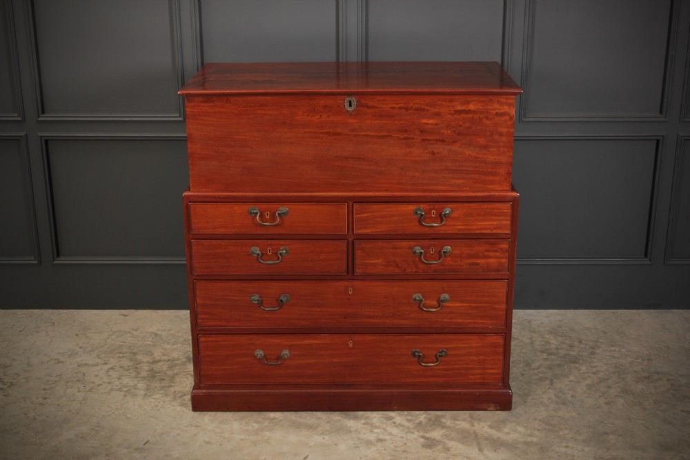 A Georgian mahogany mule chest featuring a top hinged lid above four drawers with brass handles. View VIII