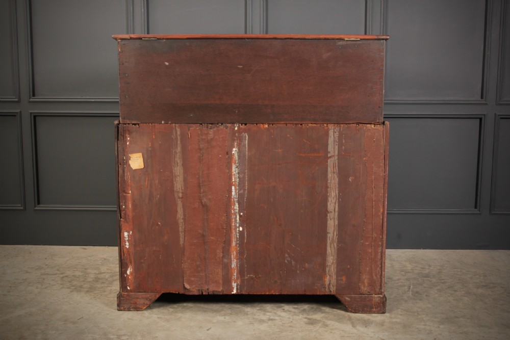 A Georgian mahogany mule chest featuring a top hinged lid above four drawers with brass handles. View XVII