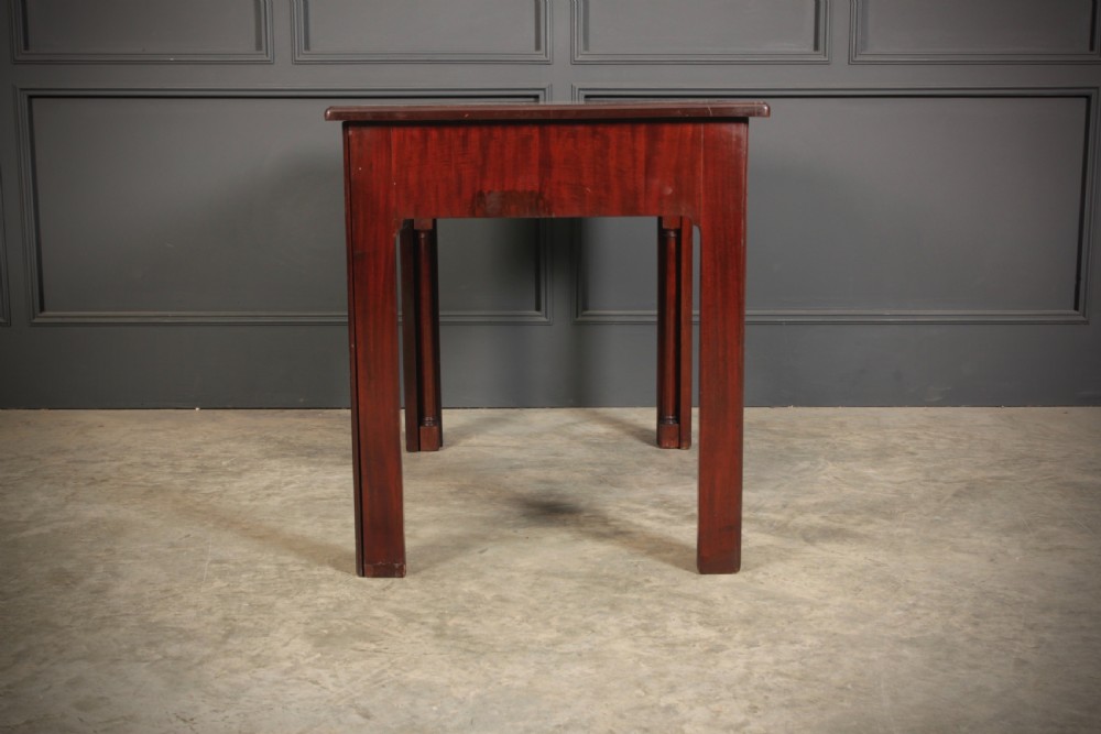 A Georgian mahogany architects table featuring a sliding front drawer with an inlaid leather writing top and square support legs. View XIII