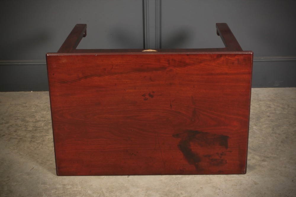 A Georgian mahogany architects table featuring a sliding front drawer with an inlaid leather writing top and square support legs. View XVI