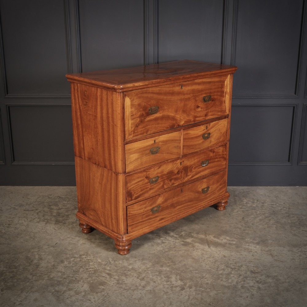 A Victorian camphor wood military campaign secretaire chest featuring brass flush recessed handles and turned feet. View II