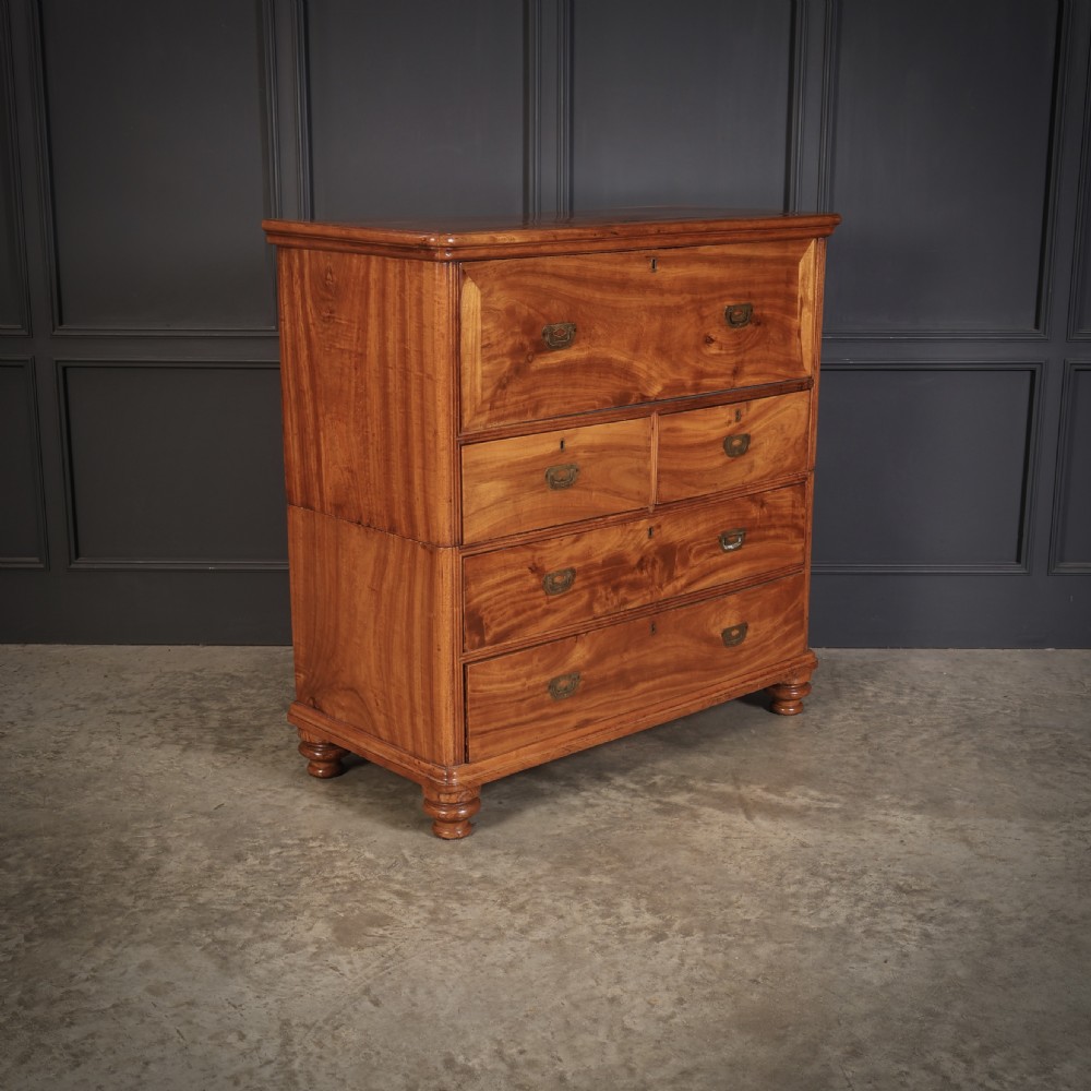 A Victorian camphor wood military campaign secretaire chest featuring brass flush recessed handles and turned feet. View X