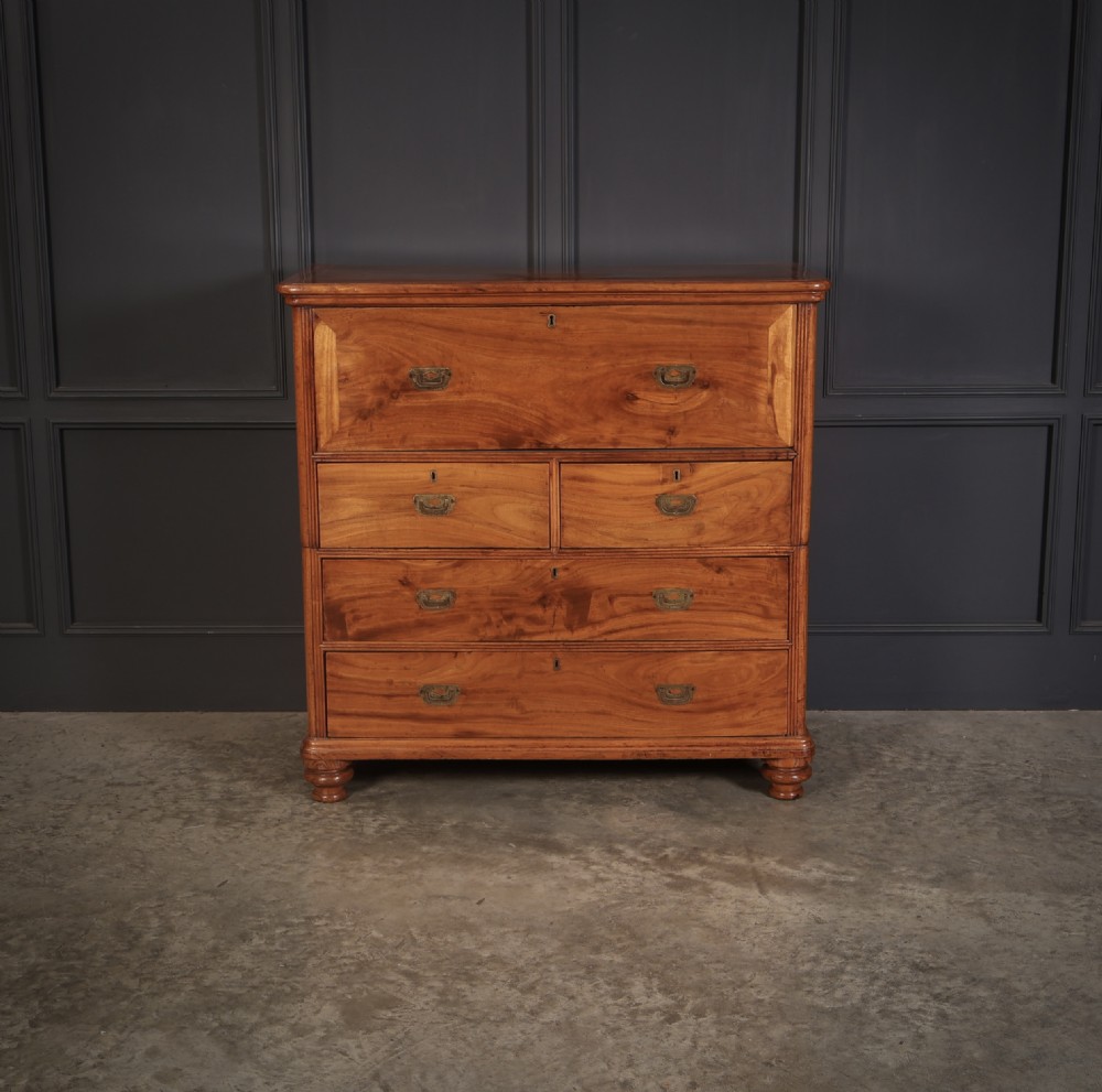 A Victorian camphor wood military campaign secretaire chest featuring brass flush recessed handles and turned feet. View III