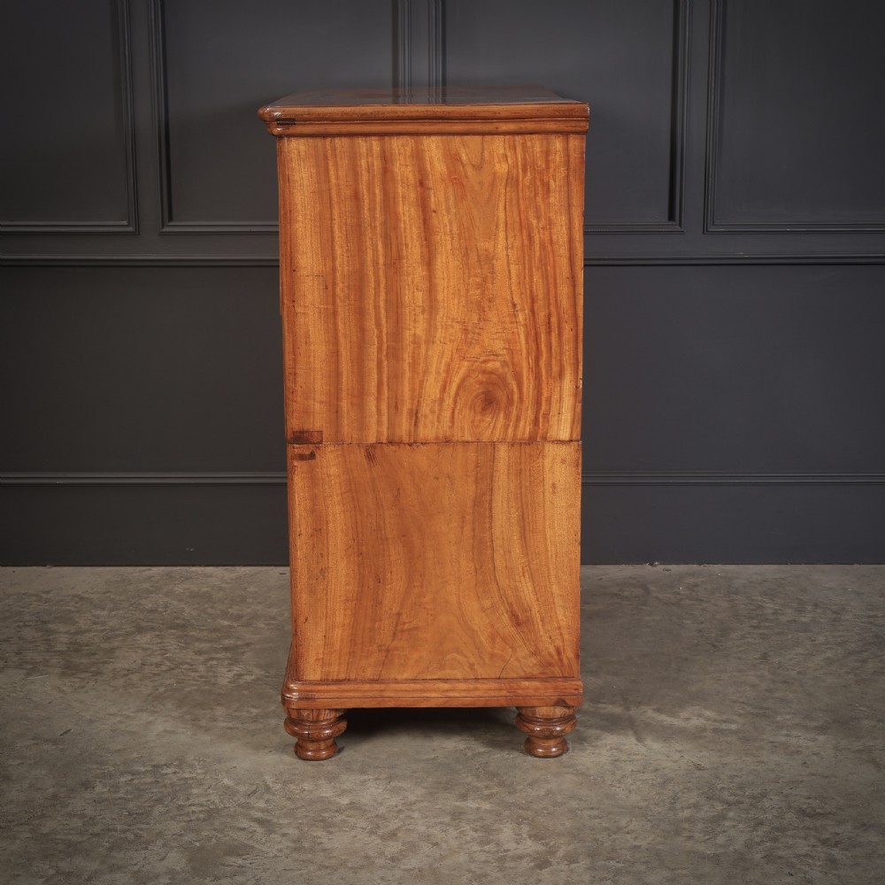 A Victorian camphor wood military campaign secretaire chest featuring brass flush recessed handles and turned feet. View XIII