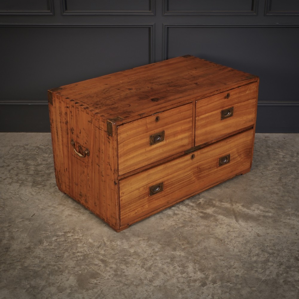 A low camphor wood campaign chest featuring recessed brass handles, brass corner brackets, exposed dovetail joints, and side brass carrying handles. View II