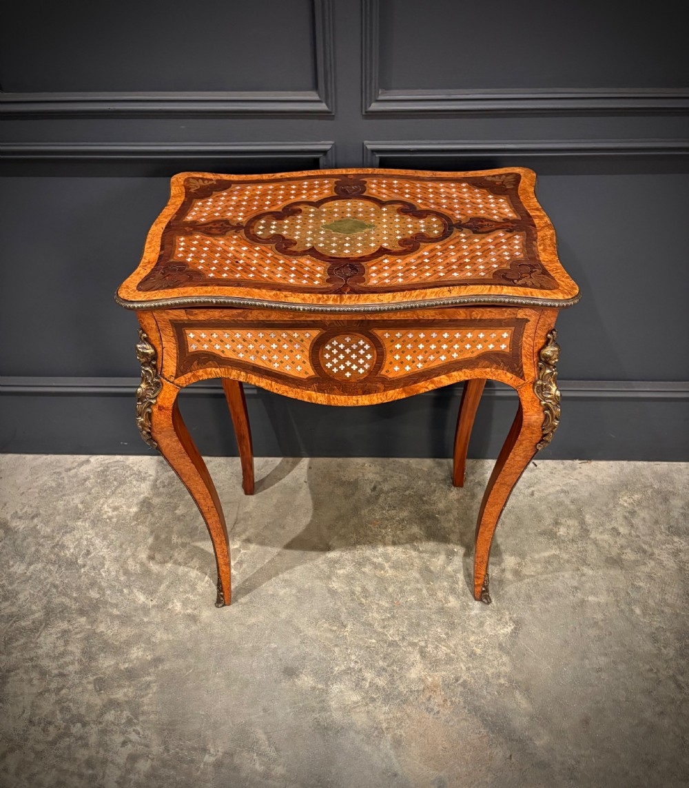 French style side table featuring geometric lattice marquetry inlay, cabriole legs, and gilded bronze ormolu mounts. View V