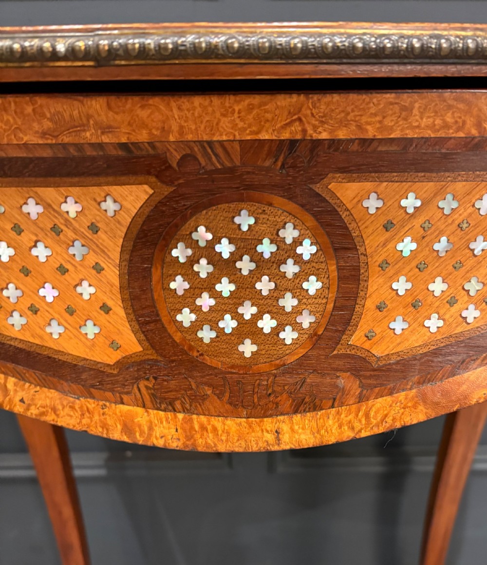 French style side table featuring geometric lattice marquetry inlay, cabriole legs, and gilded bronze ormolu mounts. View VI