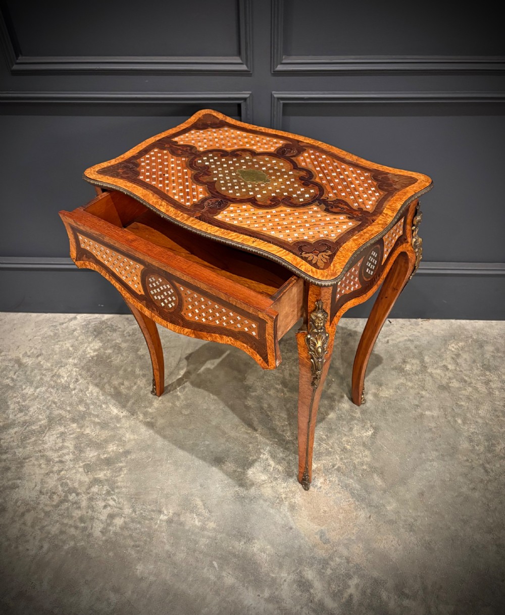 French style side table featuring geometric lattice marquetry inlay, cabriole legs, and gilded bronze ormolu mounts. View XI