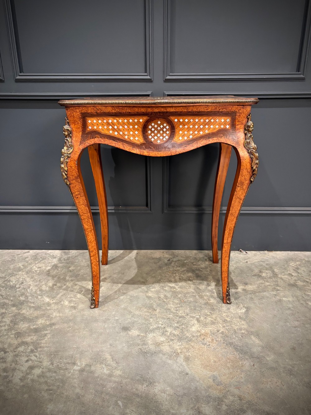 French style side table featuring geometric lattice marquetry inlay, cabriole legs, and gilded bronze ormolu mounts. View XIII