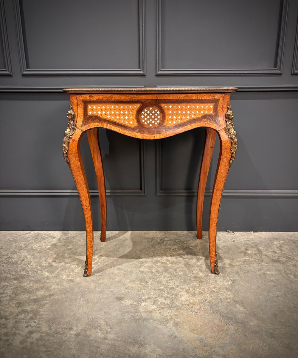 French style side table featuring geometric lattice marquetry inlay, cabriole legs, and gilded bronze ormolu mounts. View XV