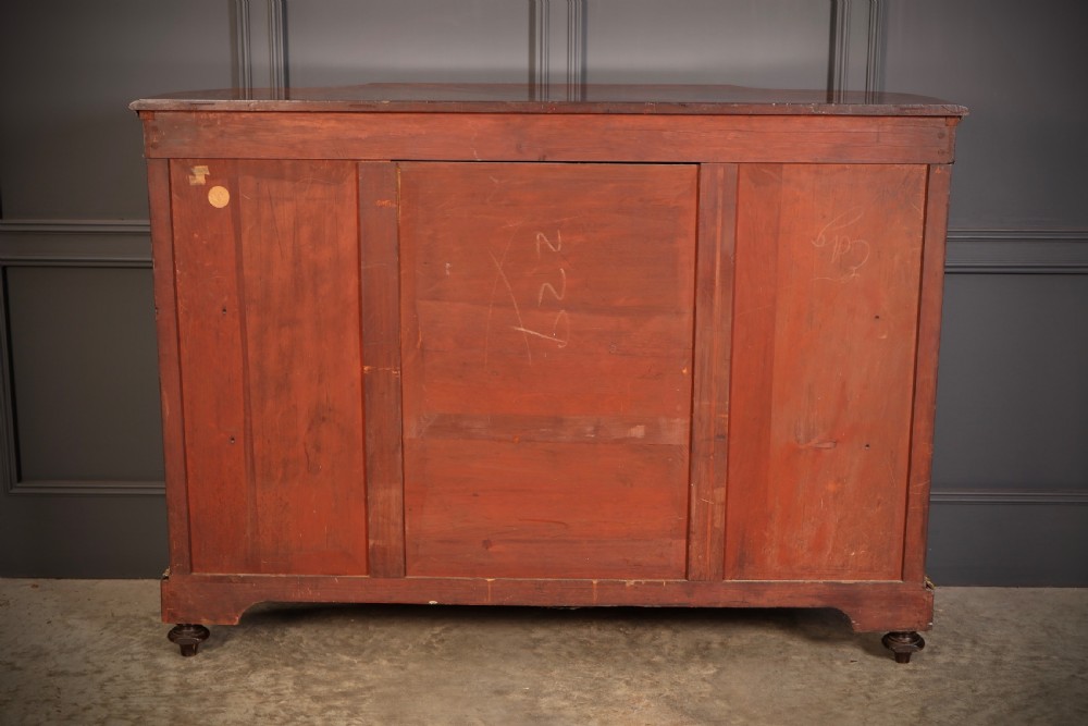 A Victorian burr walnut credenza with intricate marquetry inlay, gilt bronze mounts, and glazed display sections. View XVI