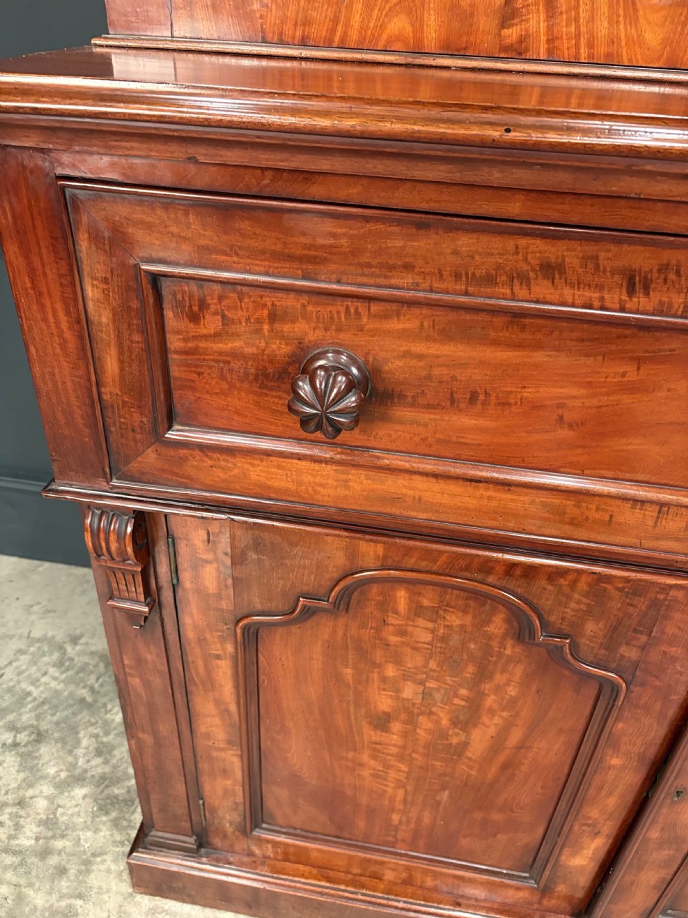 A tall Victorian mahogany secretaire bookcase featuring an upper two-door glazed cabinet over a writing drawer and lower cupboard base. View VIII
