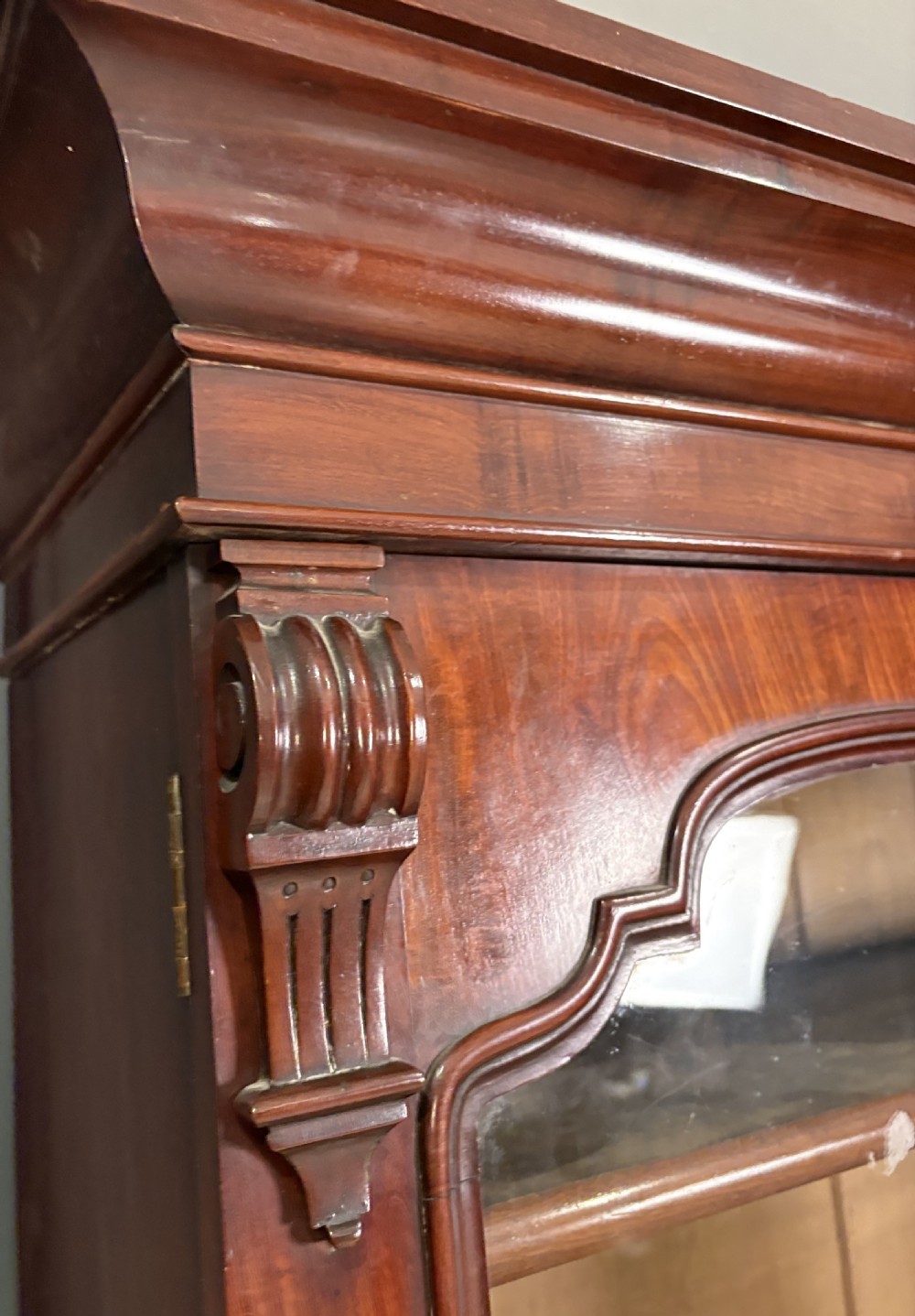 A tall Victorian mahogany secretaire bookcase featuring an upper two-door glazed cabinet over a writing drawer and lower cupboard base. View IX