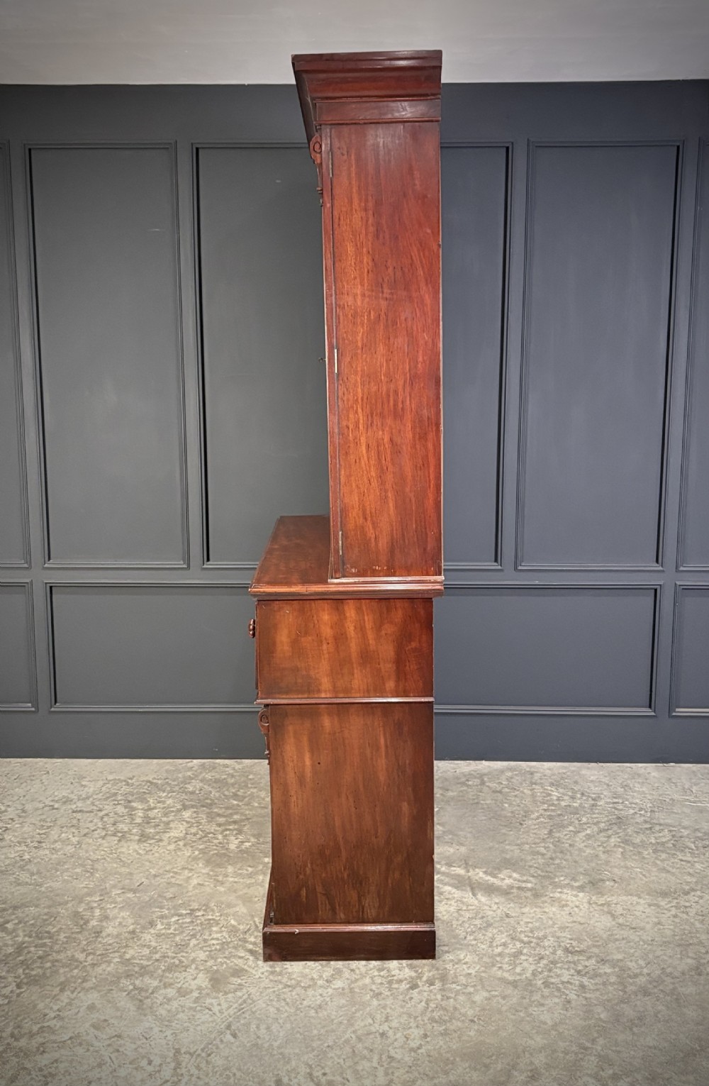 A tall Victorian mahogany secretaire bookcase featuring an upper two-door glazed cabinet over a writing drawer and lower cupboard base. View XIII