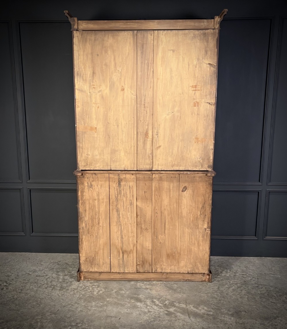 A tall Victorian mahogany secretaire bookcase featuring an upper two-door glazed cabinet over a writing drawer and lower cupboard base. View XIV