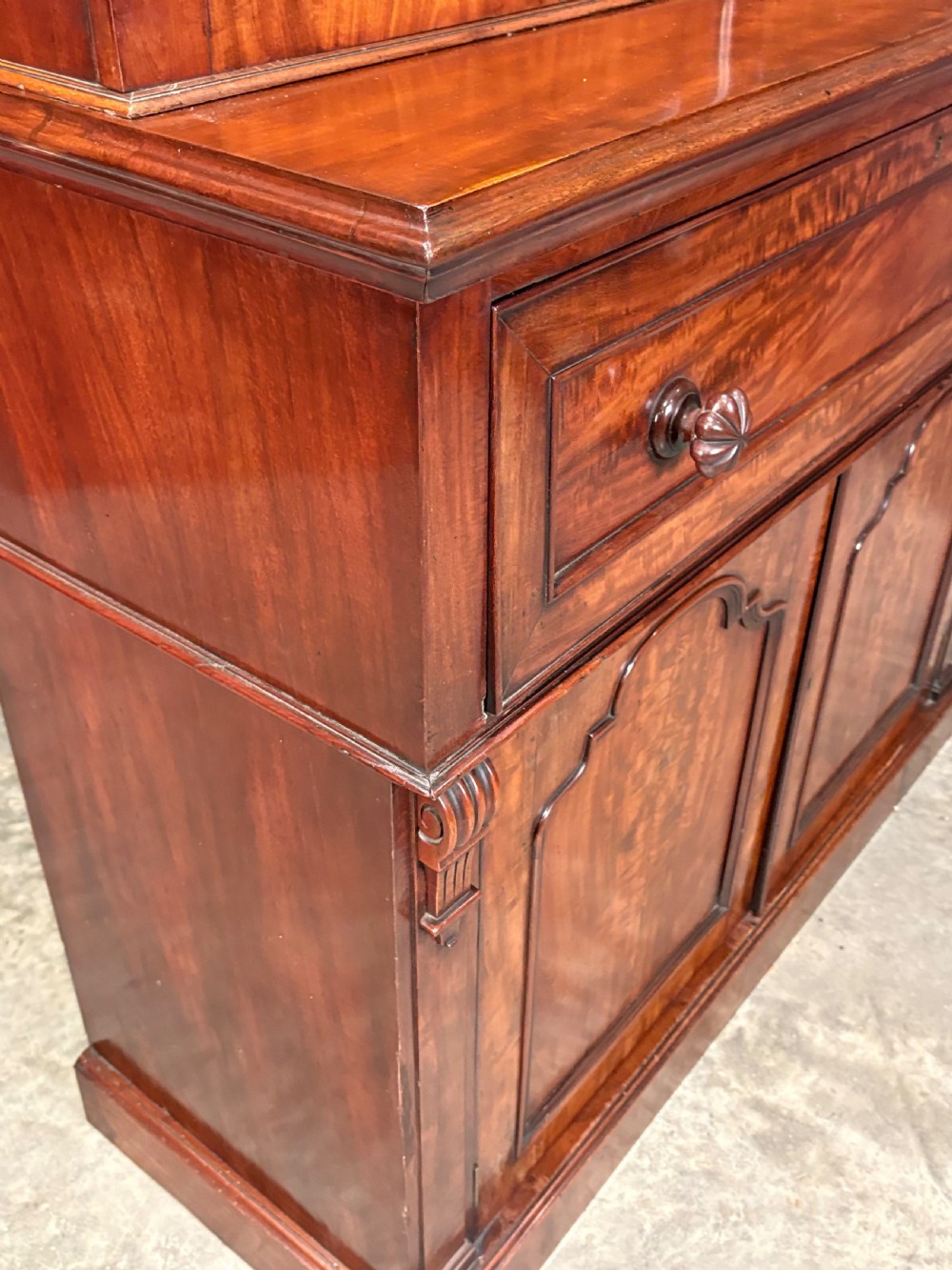 A tall Victorian mahogany secretaire bookcase featuring an upper two-door glazed cabinet over a writing drawer and lower cupboard base. View XVII