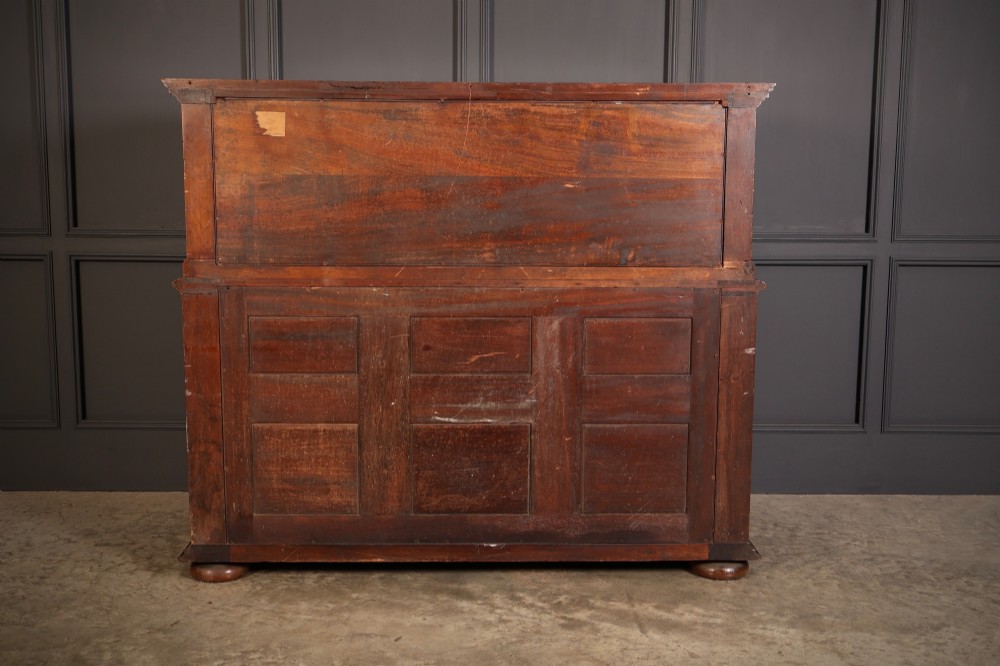 A two-tiered dark walnut sideboard featuring geometric mother of pearl inlays, hand-carved figurative relief accents, drawers, and panelled cabinet doors. View IX
