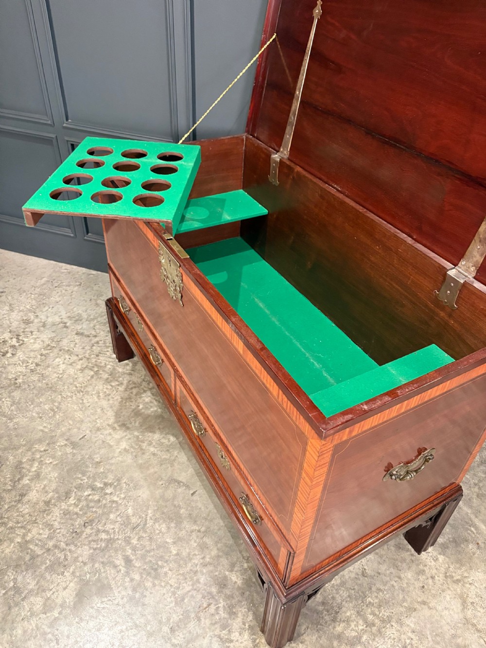 A Georgian inlaid mahogany silver chest on stand featuring satinwood crossbanding, brass side carrying handles, two lower drawers, and square legs with bracket corner supports. View XIII