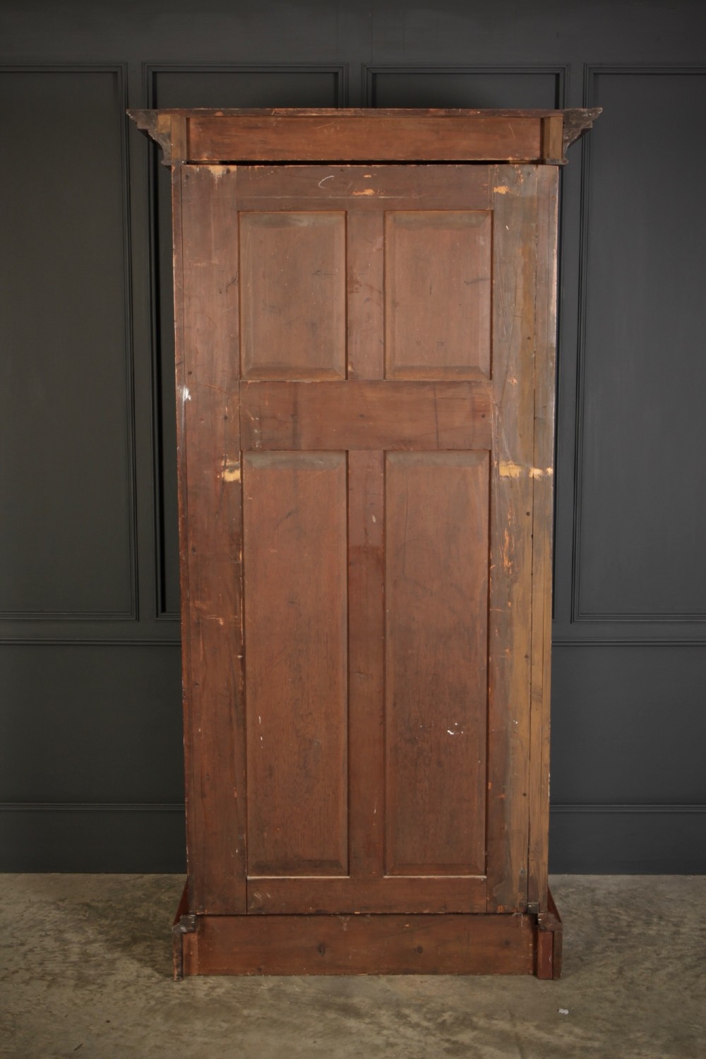 A tall Victorian burr walnut bookcase featuring open upper shelving over a double-door lower cupboard with fluted side pilasters. View XIV