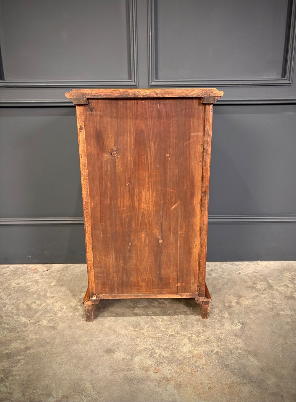 A matching pair of Victorian burr walnut bedside chests featuring three drawers each with turned wooden knobs and rounded plinth bases. View XIII