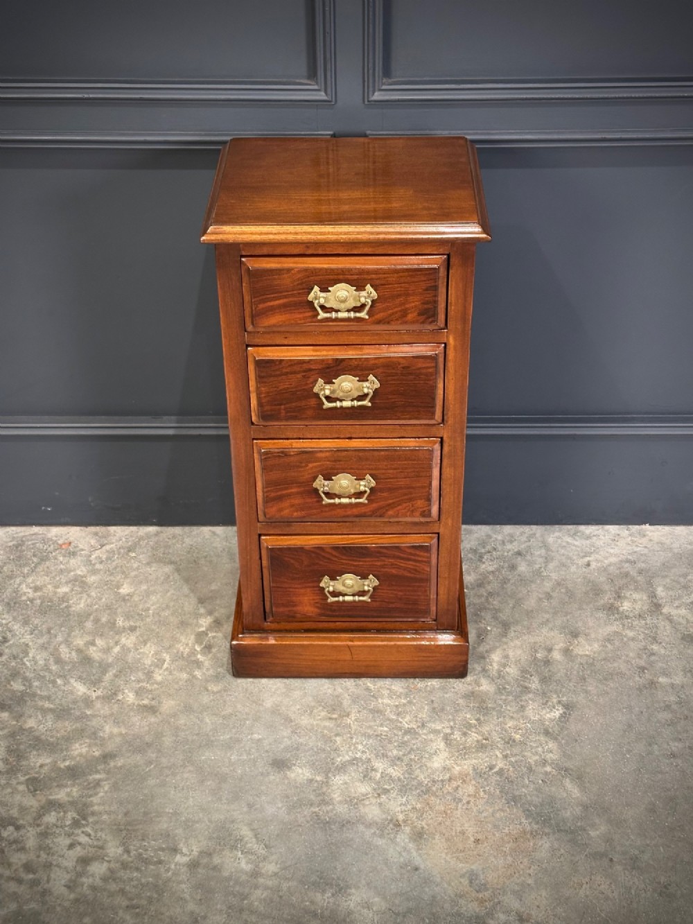 A pair of tall Edwardian mahogany and rosewood four-drawer bedside chests with brass drop handles and plinth bases. View VIII