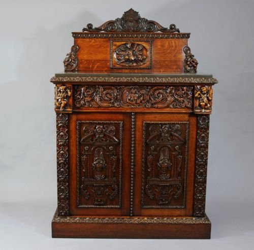 Oak Cabinet with Renaissance Carved Panels